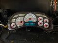 Rebuilt 2003-2007 Chevy/GMC gauge cluster lit up on the bench, stock look